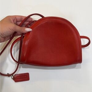 Vintage Coach Kimball Half Moon crossbody bag in red leather.